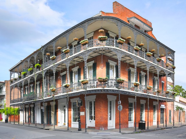 Classic New Orleans townhouse with cast-iron balcony