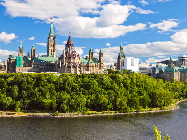 Parliament Hill seen across Ottawa River