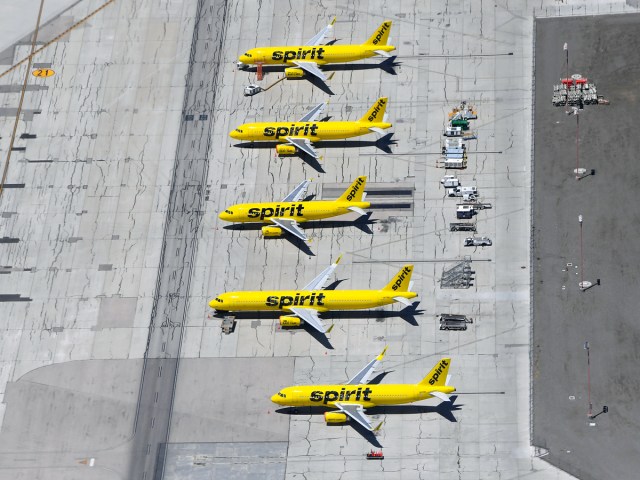 Aerial view of Spirit Airbus A320 family aircraft parked on apron