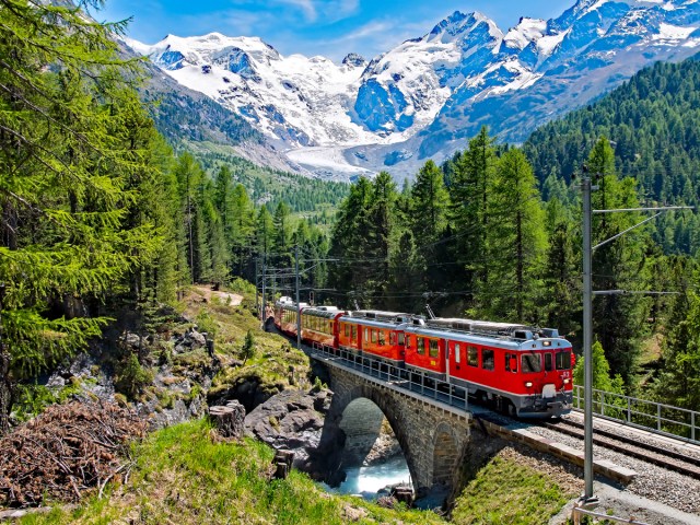 Train journeying through the Swiss Alps