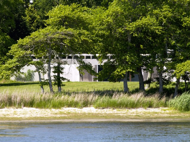 The Bunshaft Residence in East Hampton, New York, partly obscured by trees