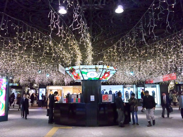 Decorative lights strung above shoppers in Japan's Tenjin Chikagai center