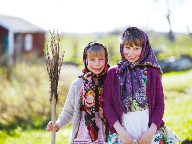 Girls dressed up as witches for Easter holiday in Sweden