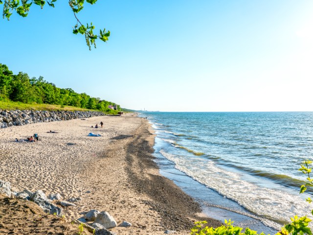 Beach goers on sandy Lake Michigan beach