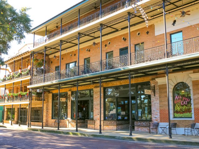 Traditional architecture with wrought-iron balconies on Front Street in Natchitoches, Louisiana