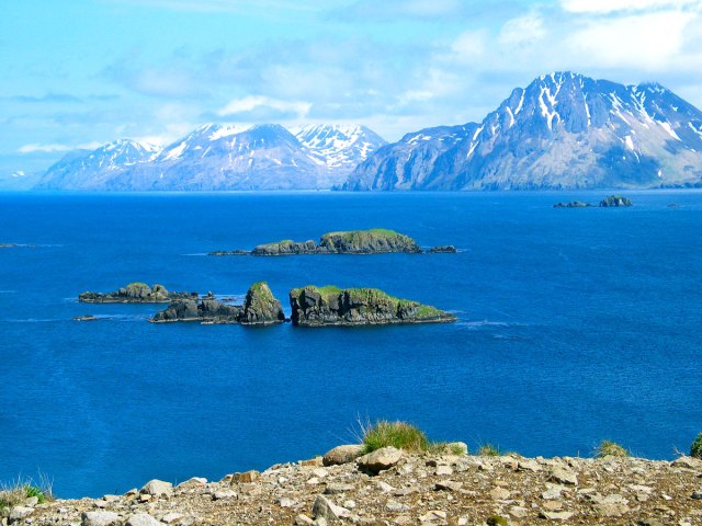 Rocky islets and snow-capped mountains on the Bering Sea