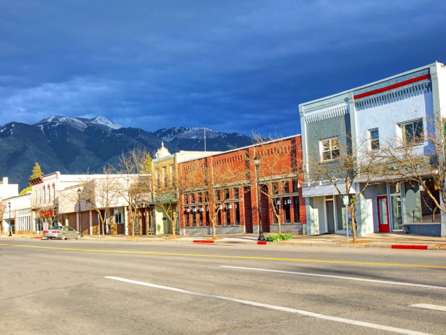 Businesses in Logan, Utah, with mountains in background