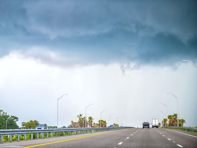 Storm clouds over Orlando highway