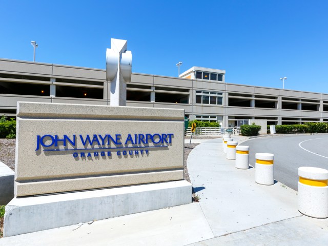 Sign for entrance to John Wayne Airport in Orange County, California