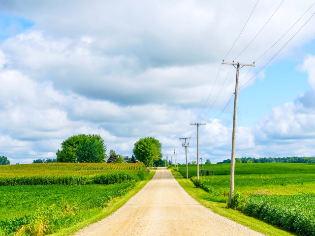 Empty rural road through Indiana farm 