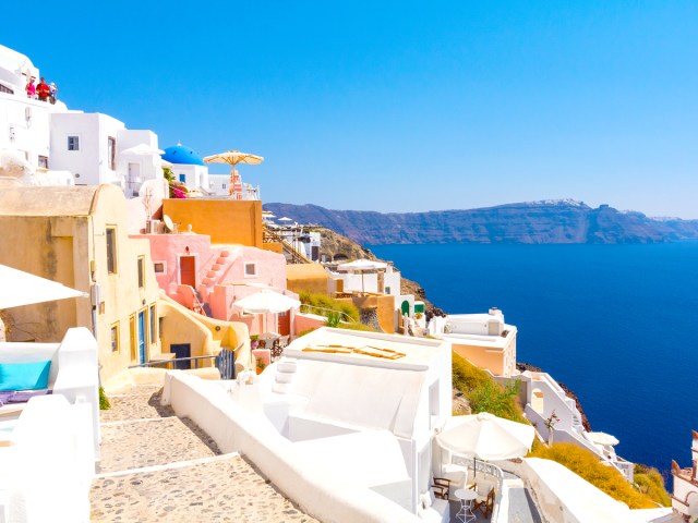 Whitewashed buildings overlooking the sea in Santorini, Greece