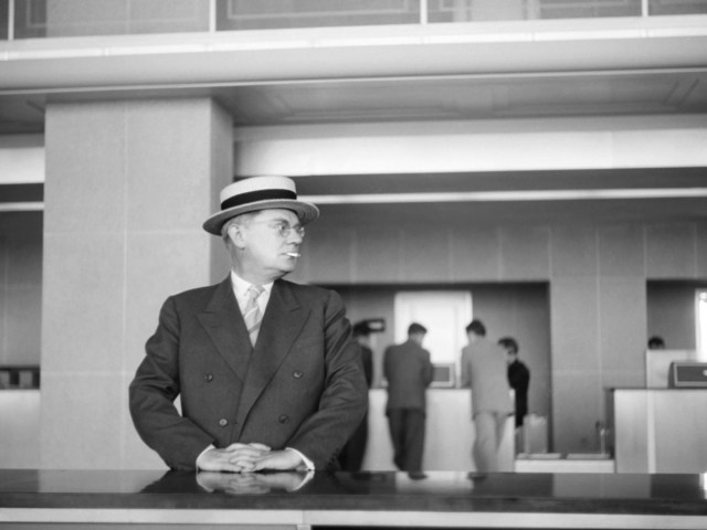 Vintage photo of traveler smoking in airport terminal