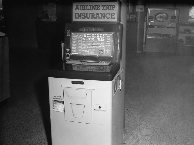 Historical photo of insurance vending machine at airport