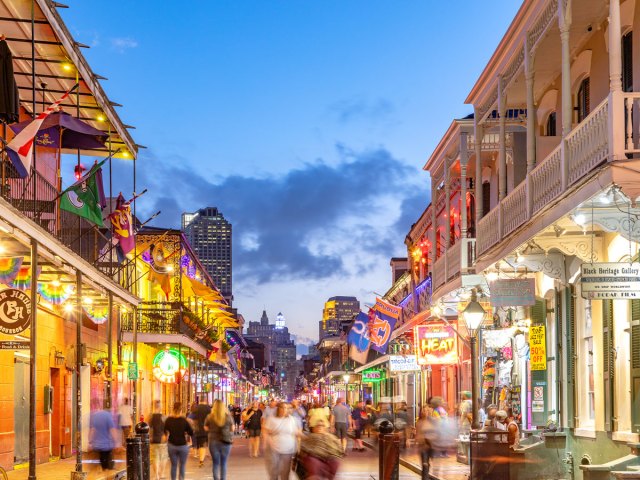 Evening crowds on Bourbon Street in New Orleans, Louisiana