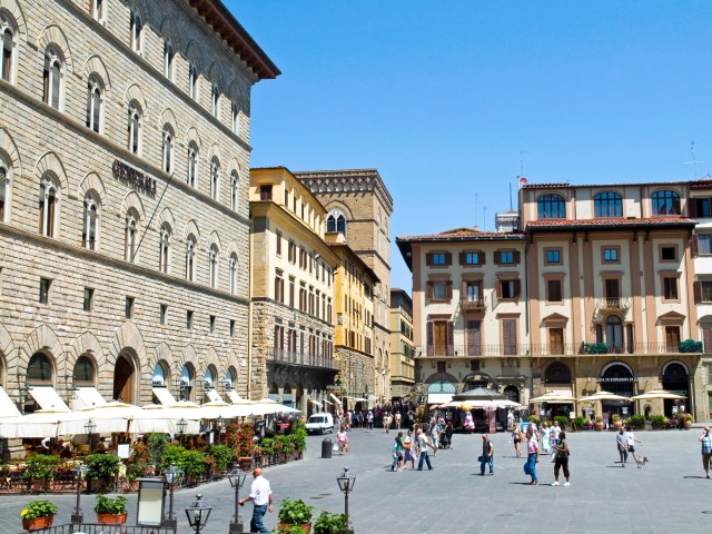 People walking through Piazza dlla Signoria in Florence, Italy