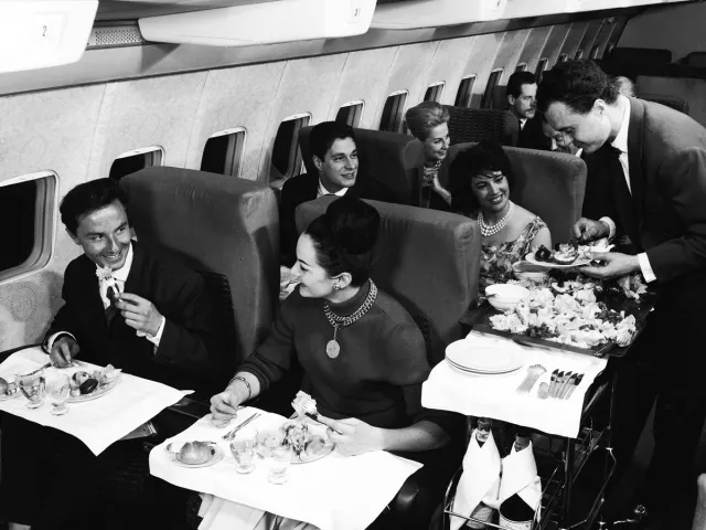 First-class passengers during meal service in the 1950s