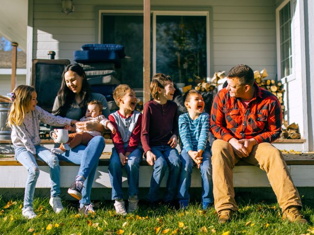 Family sitting on porch