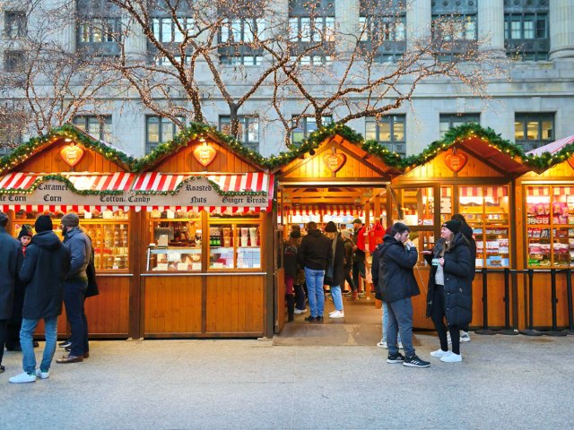 Wooden stalls selling gifts and food at Chicago's Christkindlmarket