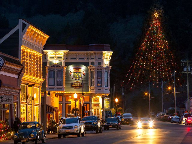 View of downtown Ferndale, California, with Main Street Christmas Tree lit at night