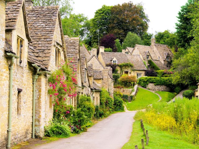 Old stone houses in charming Cotswolds village