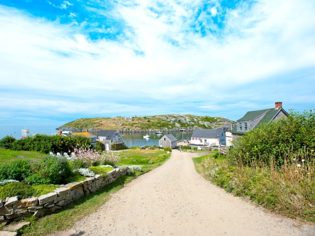 Dirt road with view of sea on Monhegan Island in Maine