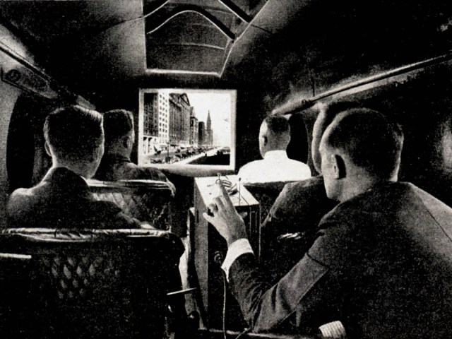 Vintage photo of projector showing in-flight movie