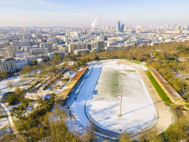 Aerial view of snow-covered Vélodrome Jacques Anquetil in Paris, France