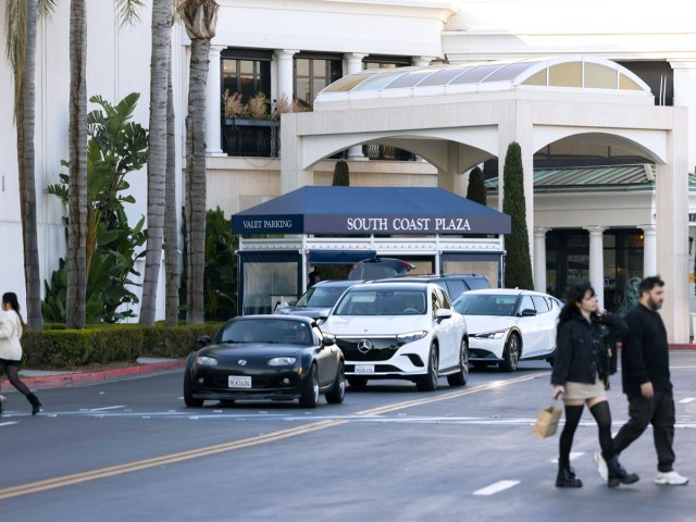 Shoppers in front of entrance to South Coast Plaza in Costa Mesa, California