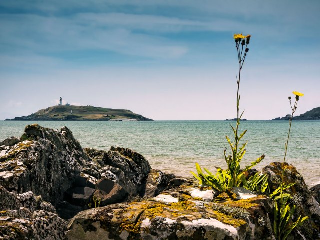 View of Little Ross Island and lighthouse in distance