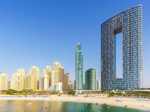 Modern skyscrapers on beach in Dubai