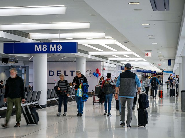 Passengers inside Terminal 5 at Chicago O'Hare International Airport