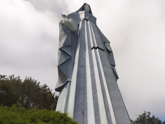 Looking up at the Monumento a la Virgen de la Paz statue in Venezuela