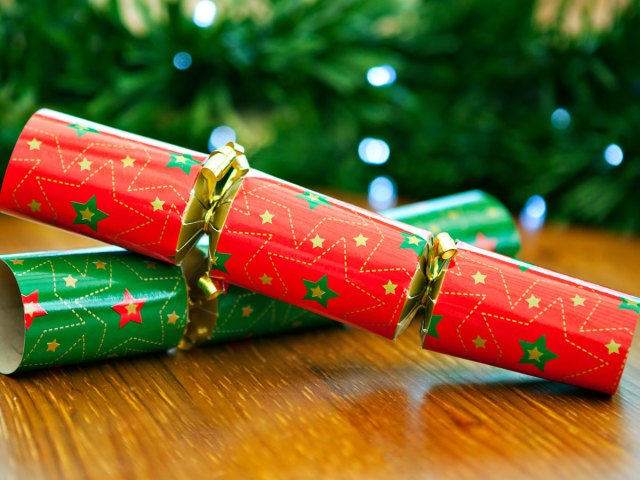 Two British Christmas crackers on a table