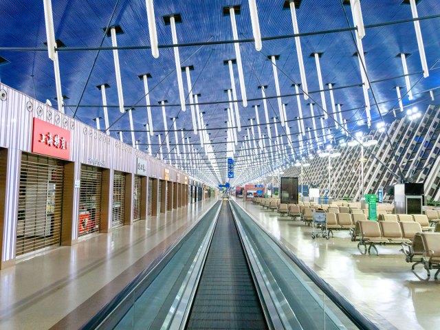 Moving walkway and gate seating areas at Shanghai Pudong Airport